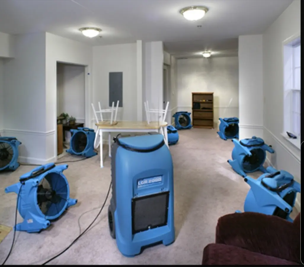 Air movers and dehumidifier setup for Water Damage Restoration in Houlton